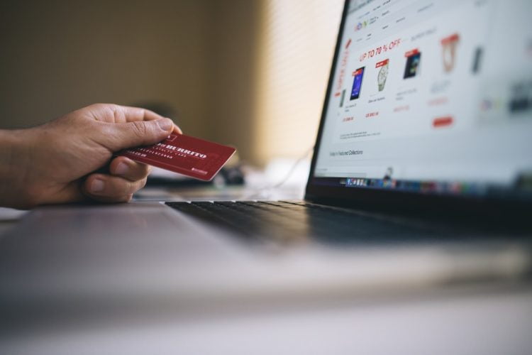 person buying online using card
